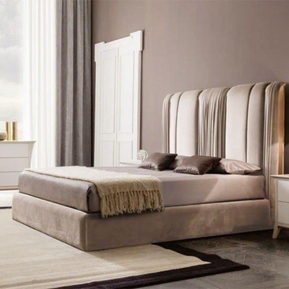 A bed with mattress beige colour