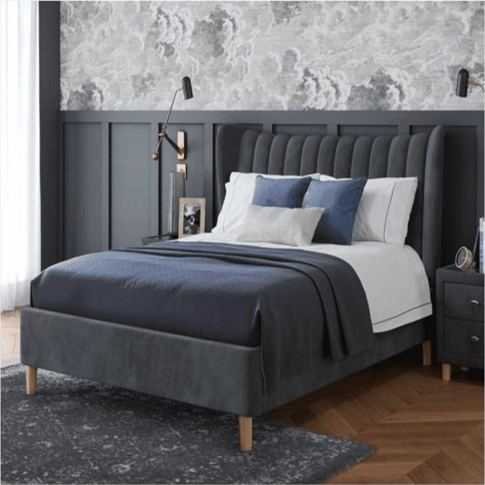 A bed with mattress black colour