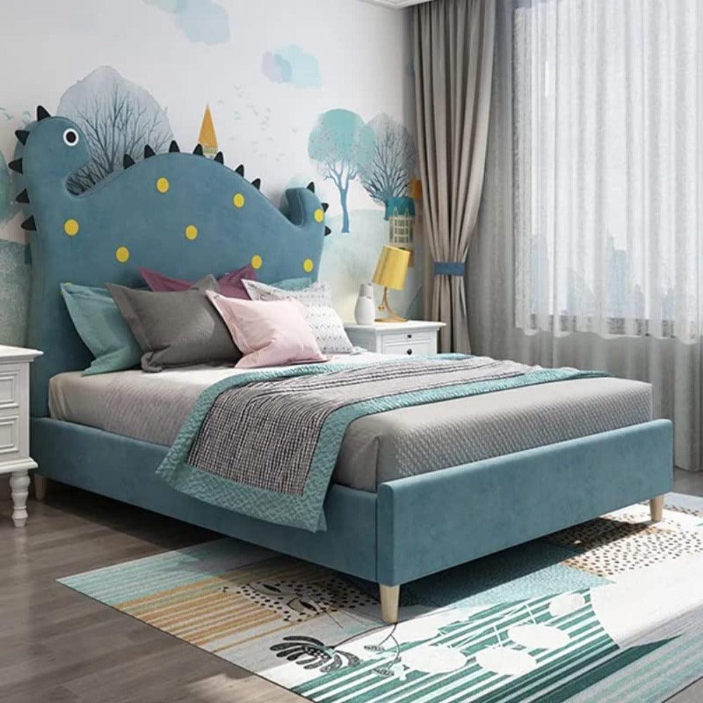 A bed with mattress blue colour