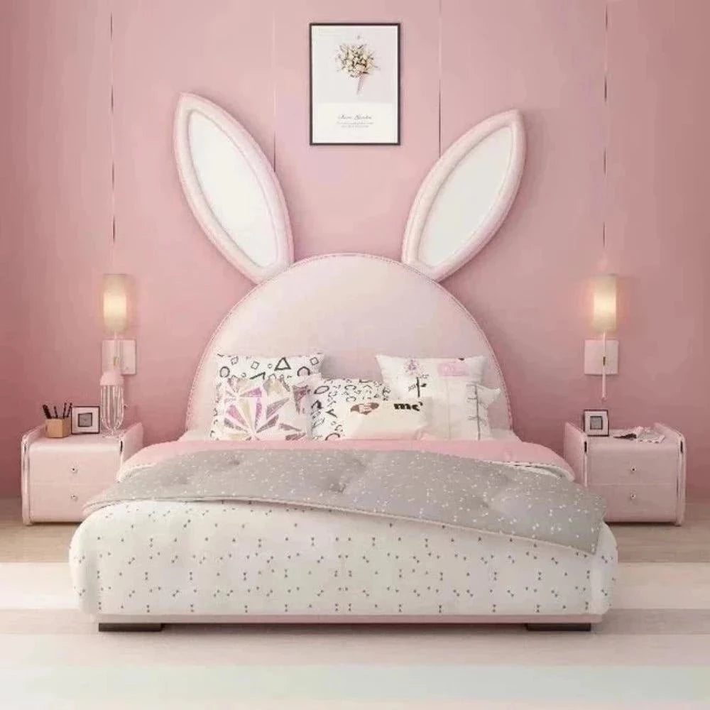 A bed with mattress baby pink colour