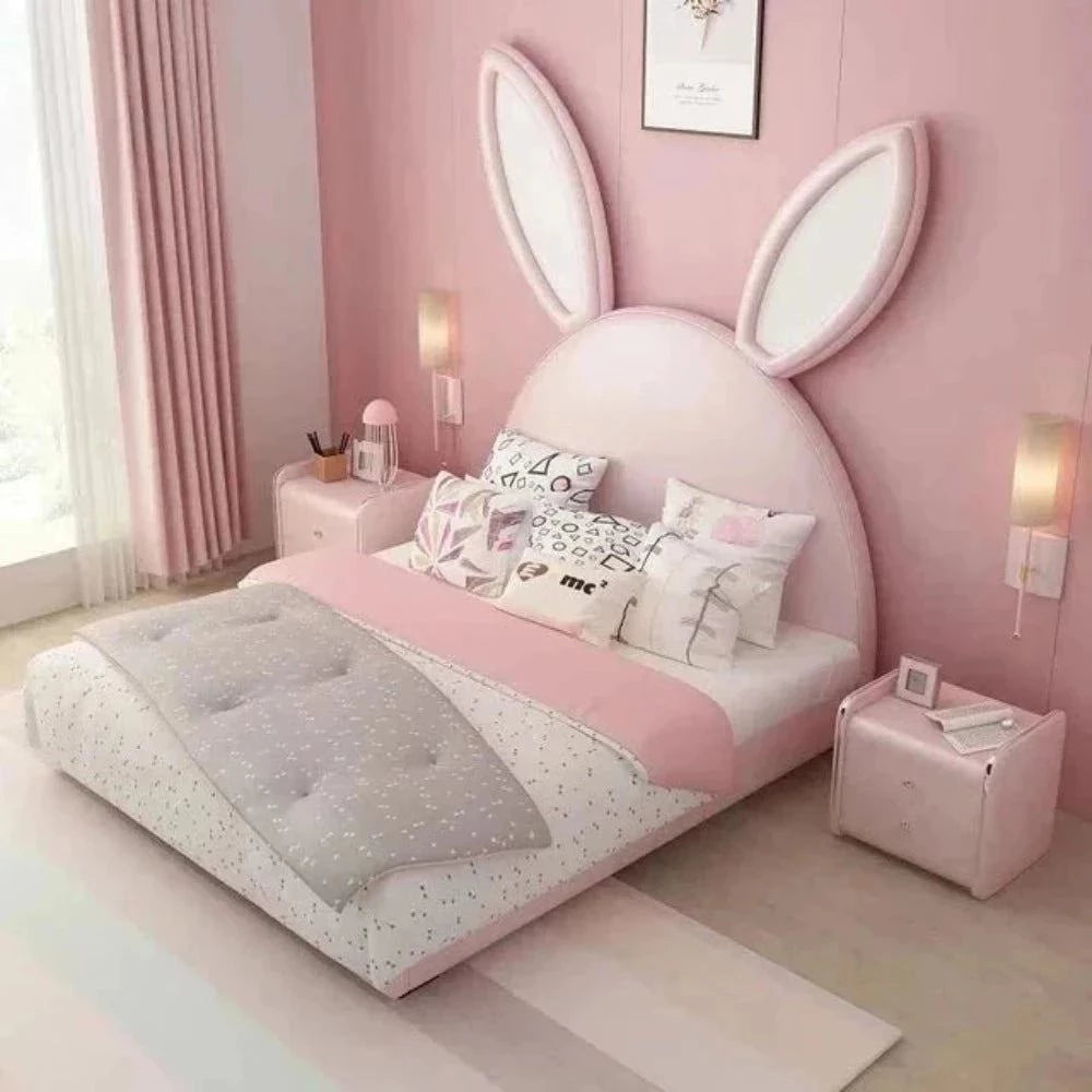 A bed with mattress pink colour