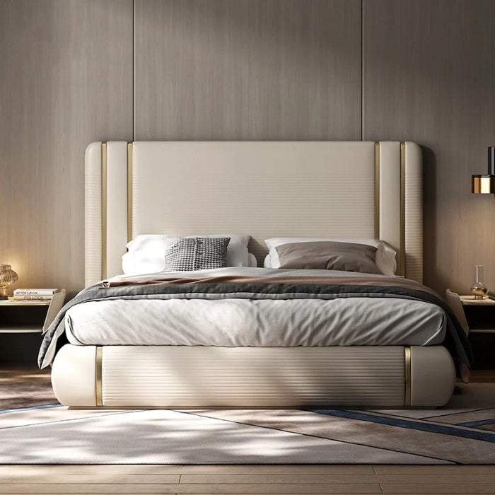 A bed with mattress beige and white colour