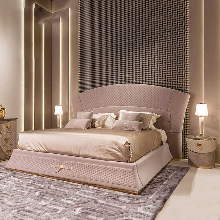 A bed with mattress baby pink colour