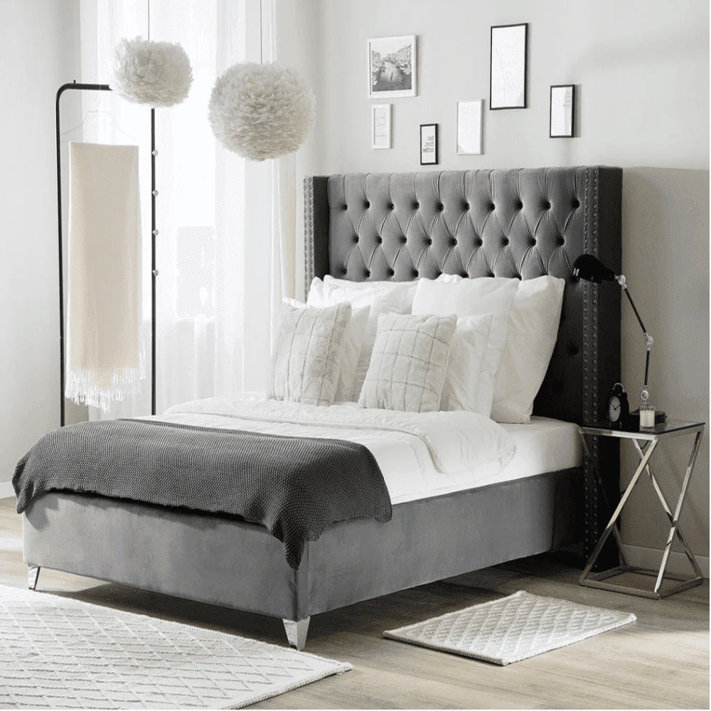 A bed with mattress black colour