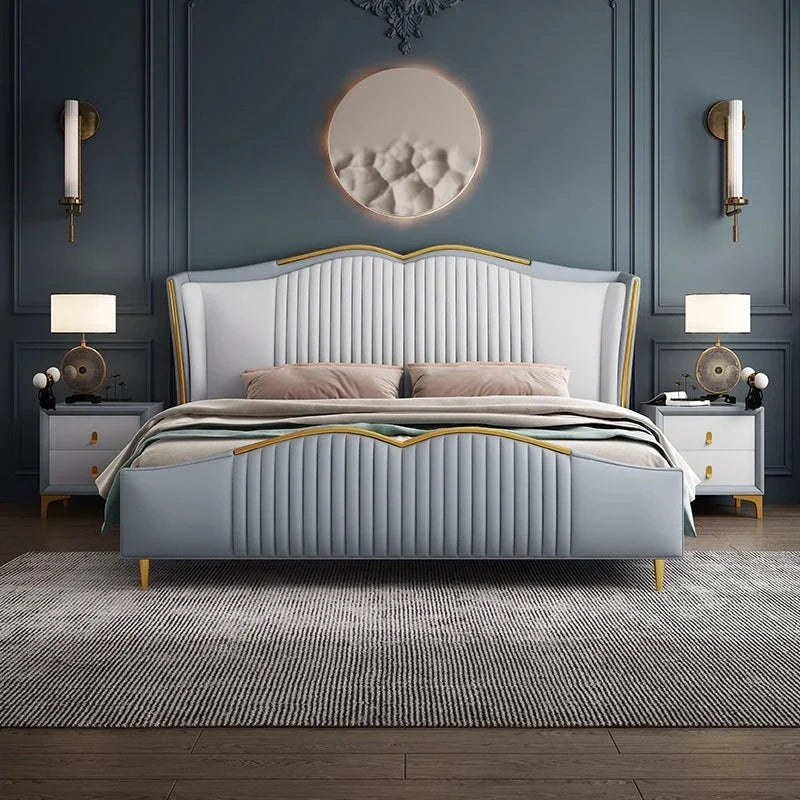 A bed with mattress grey and gold colour