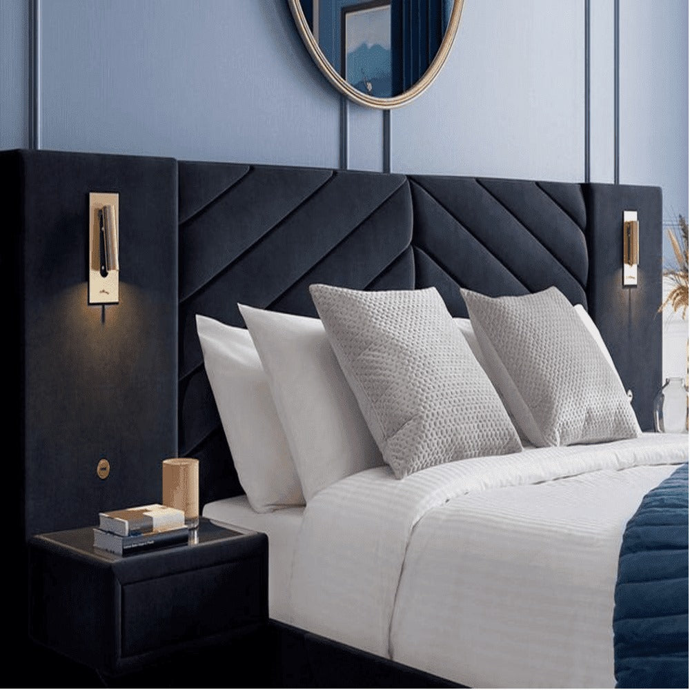 A bed with mattress navy blue colour