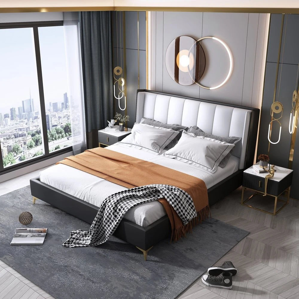 A bed with mattress black and white colour