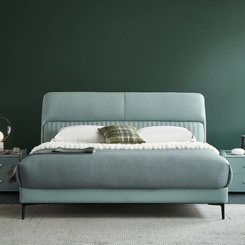 A bed with mattress ice green colour