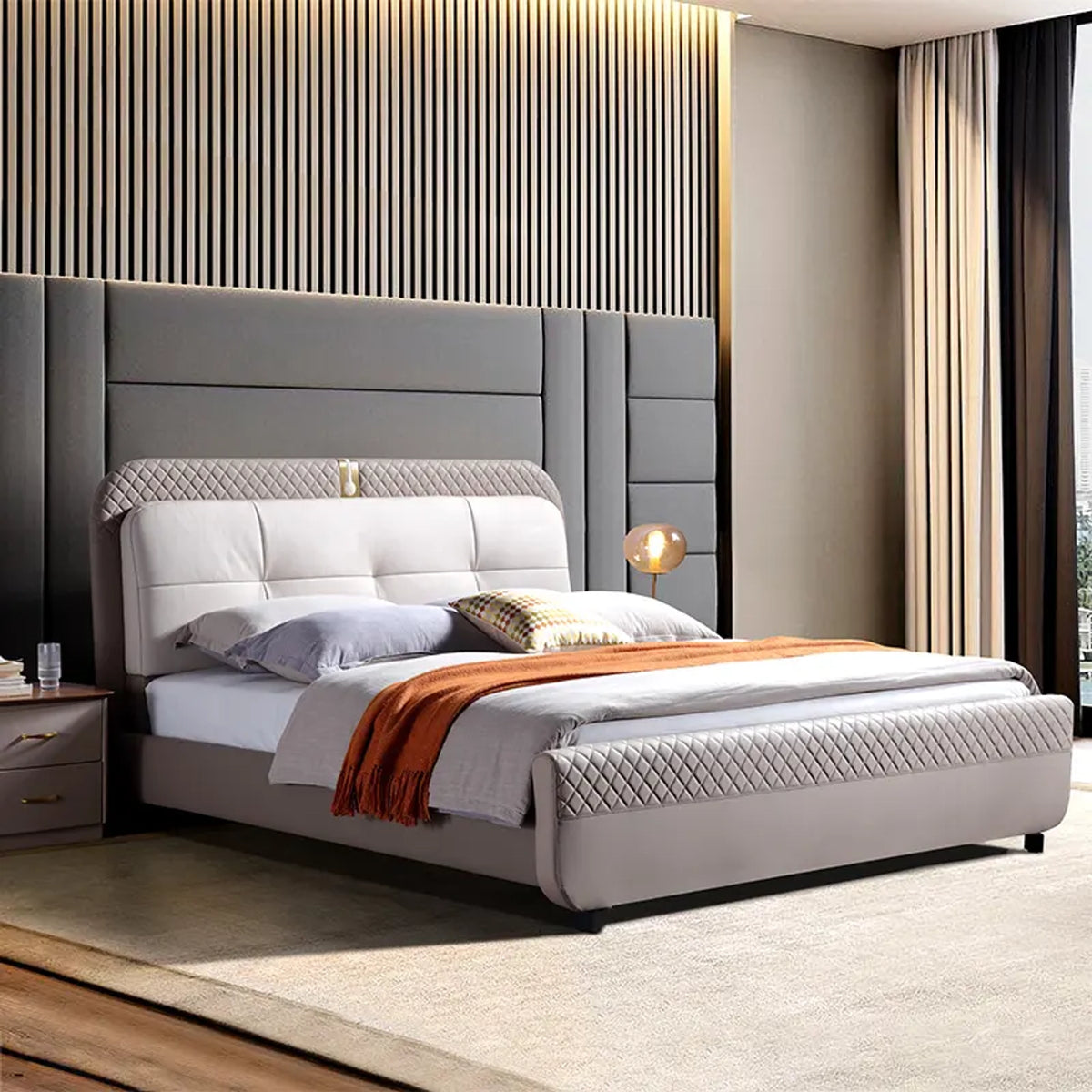a bed with mattress in grey and white color