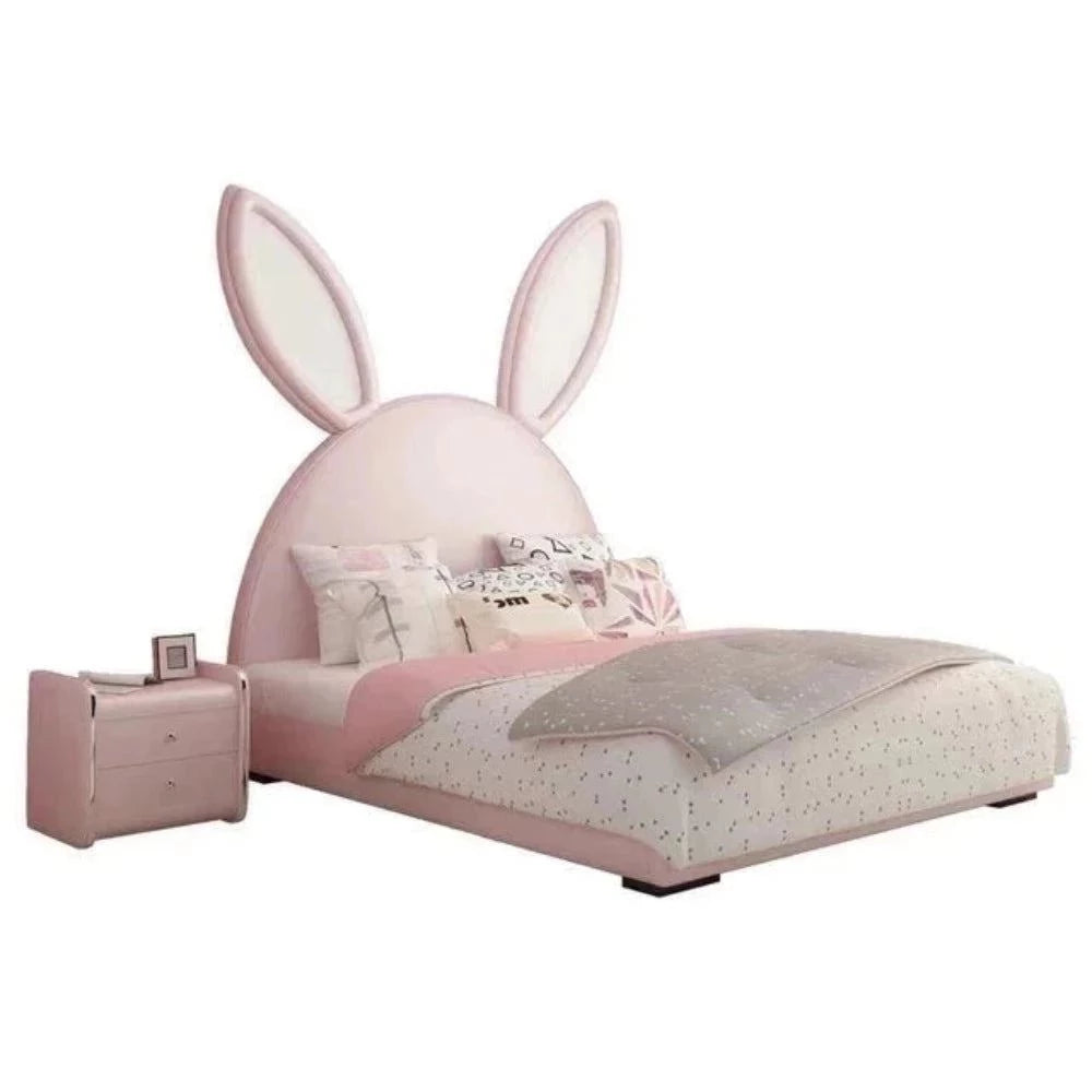 A bed with mattress pink colour